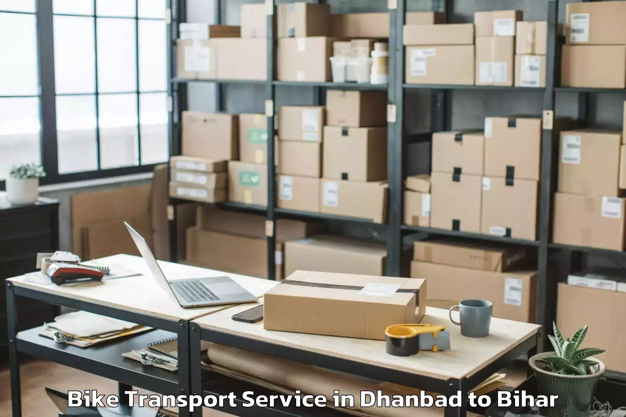 Book Dhanbad to Tetaria Bike Transport Online